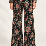 Héloïse Jacquard Wide-Leg Pants in Black Floral, front view on an ivory background