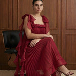Merlot Rêverie Bow-Shoulder Pleated Maxi Dress in Wine — seated view