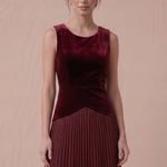 Sleeveless velvet bodice and curved waist detail of the Merlot Starlight dress