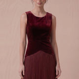 Sleeveless velvet bodice and curved waist detail of the Merlot Starlight dress