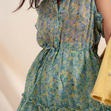Mini dress with ruffle trims in vintage floral in green