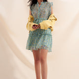 Mini dress with ruffle trims in vintage floral in green