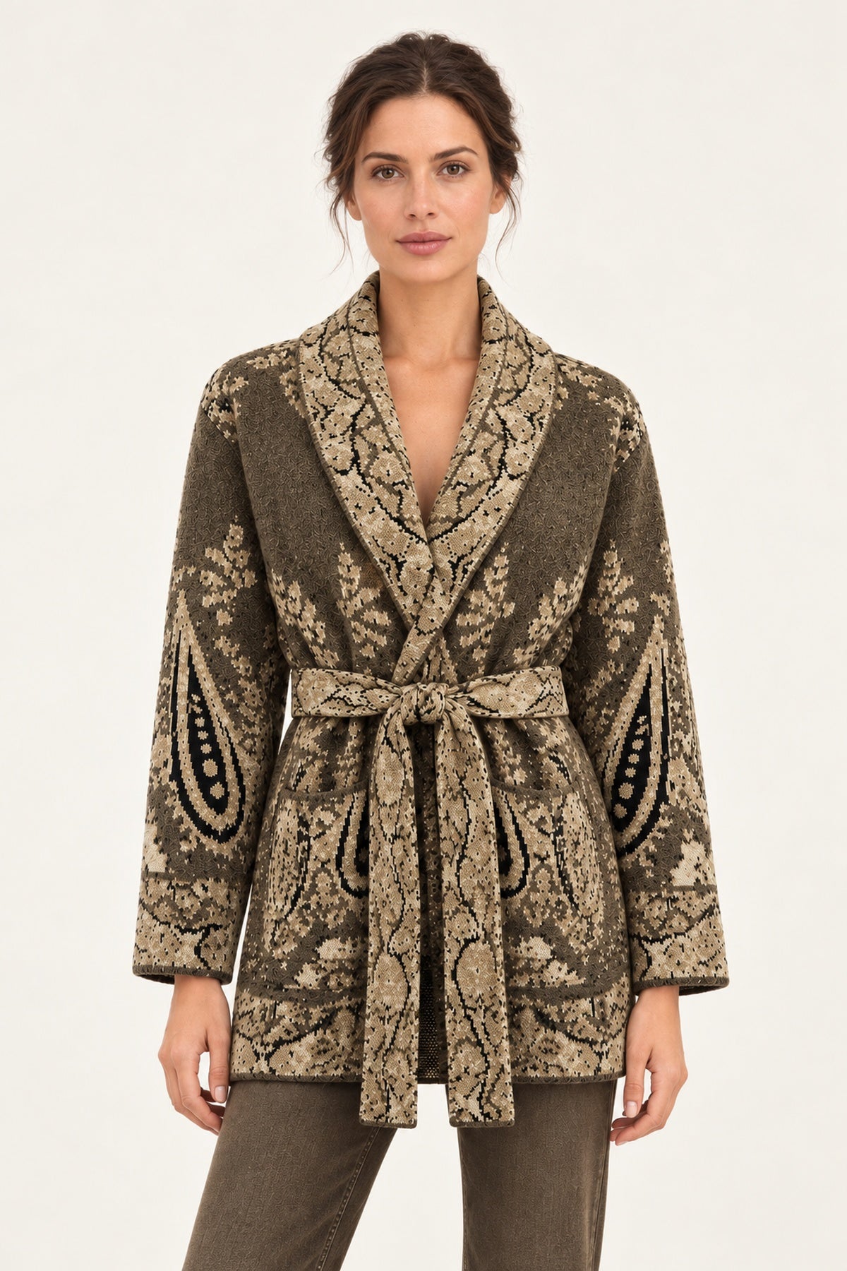 Nadège taupe paisley jacquard belted cardigan with shawl collar and patch pockets on a model, ivory studio background