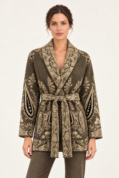 Nadège taupe paisley jacquard belted cardigan with shawl collar and patch pockets on a model, ivory studio background