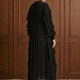 Nocturne Cascade Plissé Maxi Dress in Black — back view