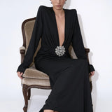 Noir Solstice crystal waist maxi dress, seated view