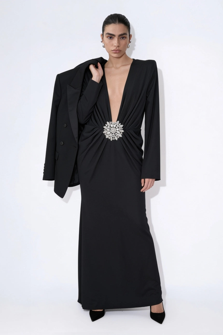 Noir Solstice long-sleeve black maxi dress styled with a blazer