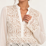 Close-up of Georgette Lace Blouse floral lace neckline and scalloped cuff