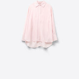 oversized baby pink shirt with bow in the back
