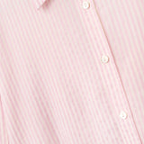 oversized baby pink shirt with bow in the back
