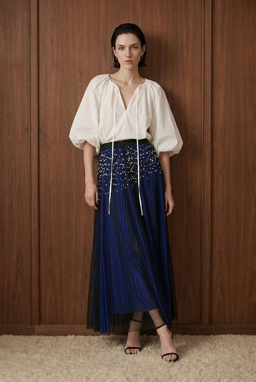 Perle Cascade Pleated Midi Skirt — blue front view