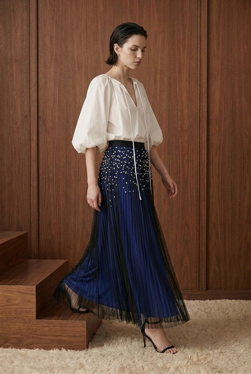 Perle Cascade Pleated Midi Skirt — blue movement view