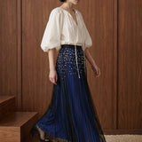 Perle Cascade Pleated Midi Skirt — blue movement view