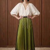 Perle Cascade Pleated Midi Skirt — olive front view
