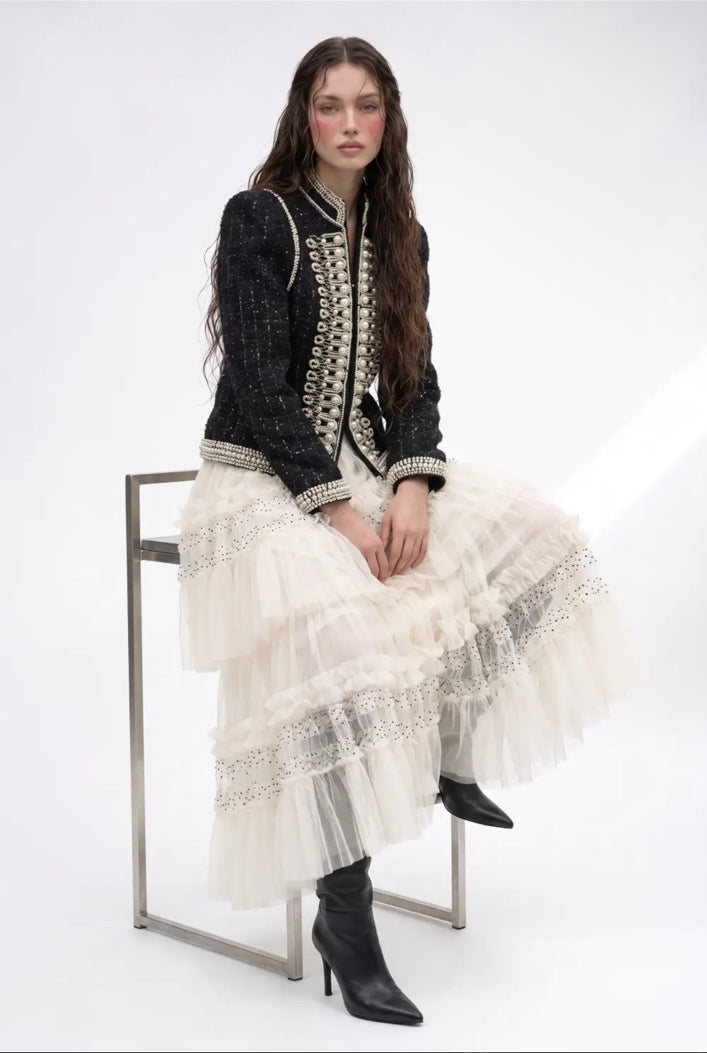 Regent Pearl-Embellished Bouclé Jacket — Black jacket front view with military braiding, faux pearls, stand collar and long sleeves