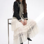 Regent Pearl-Embellished Bouclé Jacket — Black jacket front view with military braiding, faux pearls, stand collar and long sleeves