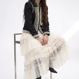 Regent Pearl-Embellished Bouclé Jacket — Black jacket front view with military braiding, faux pearls, stand collar and long sleeves