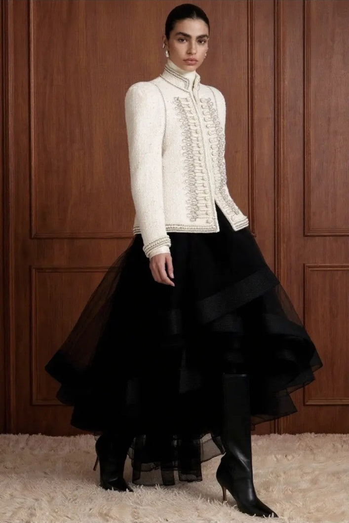 Regent Pearl-Embellished Bouclé Jacket — Ivory jacket side view showing the structured shoulders and high-hip length