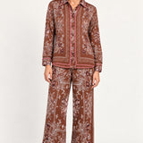 Séverine Passila Chocolate pants, front model view on an ivory studio backdrop