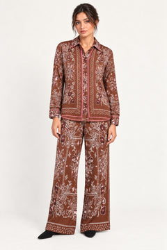 Séverine Passila Chocolate pants, front model view on an ivory studio backdrop