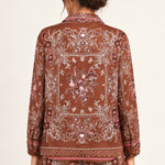 Séverine Passila Chocolate shirt, back model view on an ivory studio backdrop