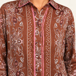 Séverine Passila Chocolate shirt, collar and print close-up on an ivory studio backdrop
