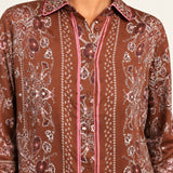Séverine Passila Chocolate shirt, collar and print close-up on an ivory studio backdrop