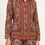 Séverine Passila Chocolate shirt, half-length detail view on an ivory studio backdrop