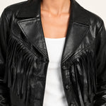Sidonie fringe faux-leather jacket in Black, close-up of lapels and fringe on an ivory studio backdrop