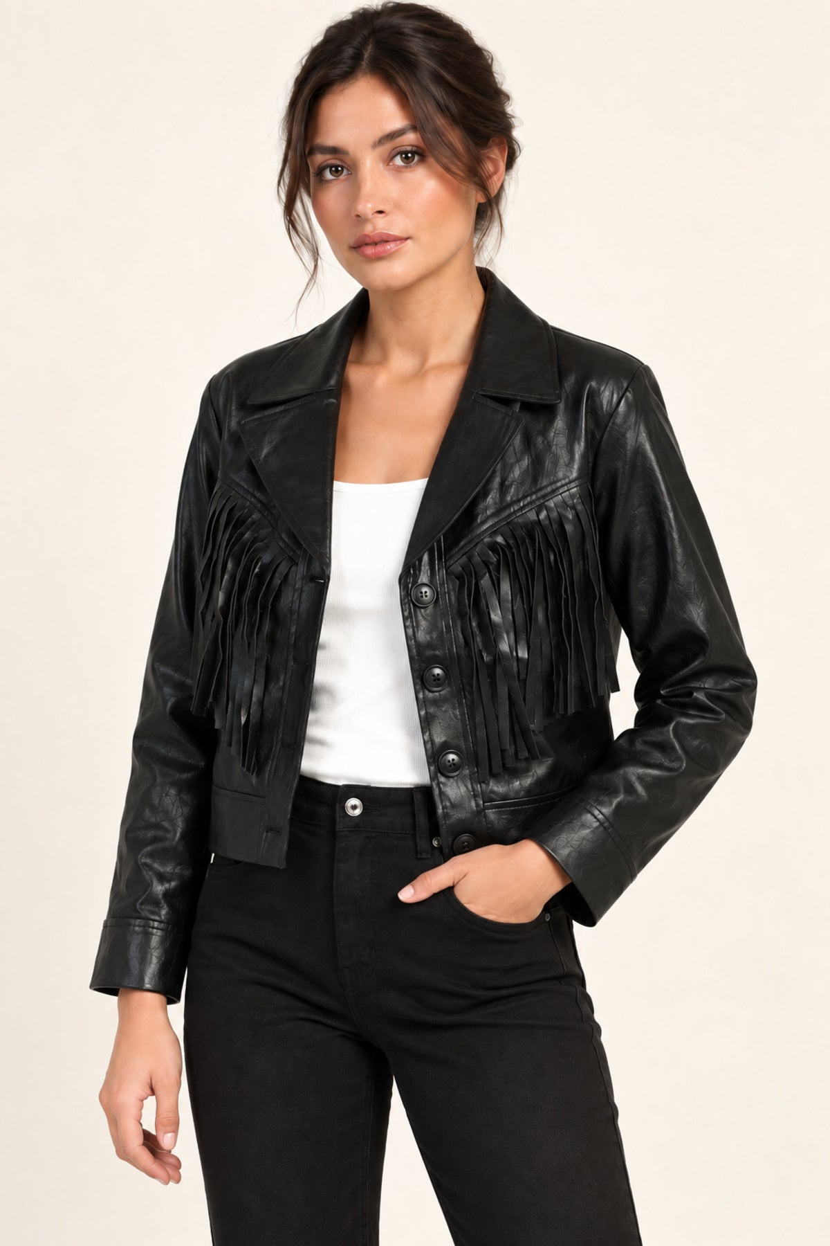 Sidonie fringe faux-leather jacket in Black, half-length model view on an ivory studio backdrop