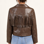 Sidonie fringe faux-leather jacket in Coffee, back view showing fringe on an ivory studio backdrop