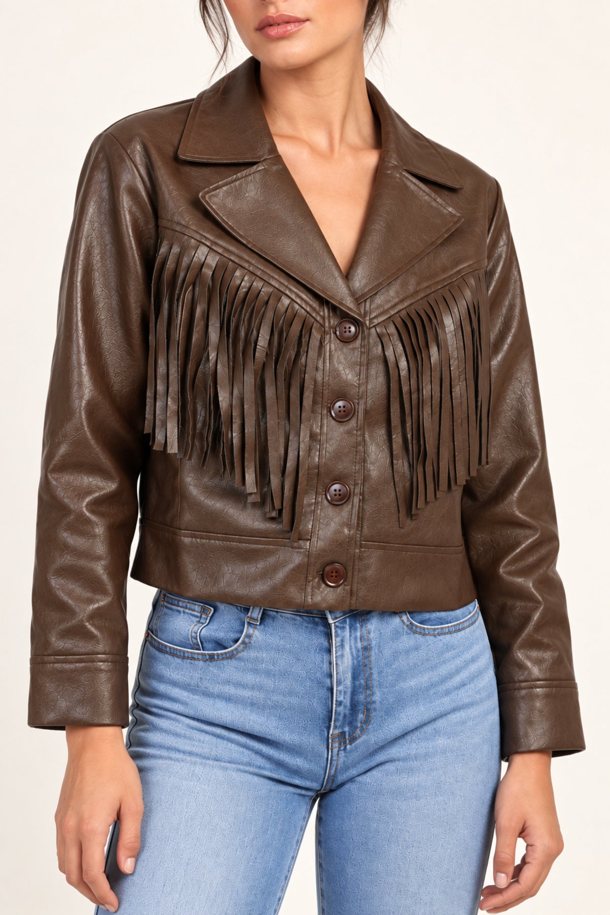 Sidonie fringe faux-leather jacket in Coffee, half-length model view on an ivory studio backdrop