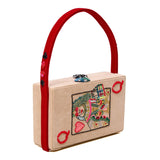 Simitri Poker Clutch Bag with embroidered playing-card motifs and red strap, angle view