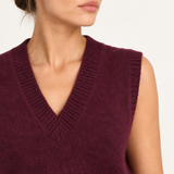 Solène burgundy sweater vest with floral trousers — close-up