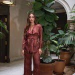 Terracotta Reverie satin jacket and trousers, front view