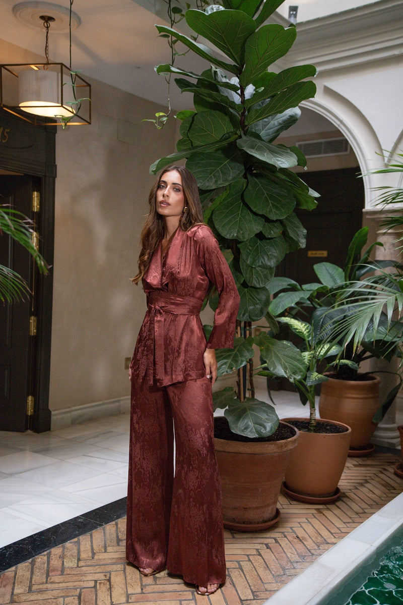 Terracotta Reverie wide-leg satin suit, angled full-length view
