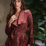 Terracotta Reverie wrap jacket with fluid lapels and waist tie