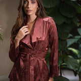 Terracotta Reverie wrap jacket with fluid lapels and waist tie