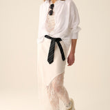 white satin skirt with lace at the bottom