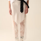 white satin skirt with lace at the bottom