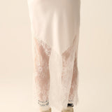 white satin skirt with lace at the bottom