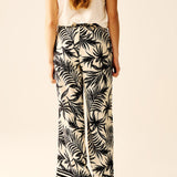 Wide Leg Pants In White With Floral Detail In Black