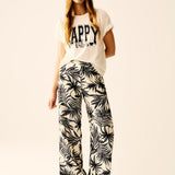 Wide Leg Pants In White With Floral Detail In Black